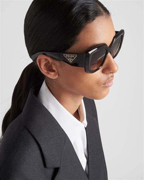 sunglasses with prada logo|prada female sunglasses.